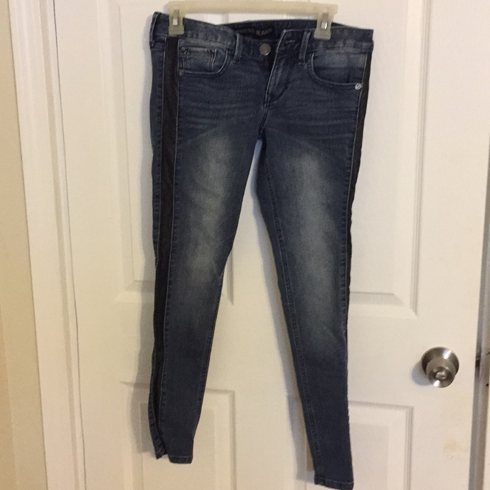 Express jeans with black leather stripe